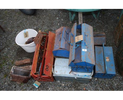 A quantity of toolboxes, drain hopper and two large sledgehammer heads