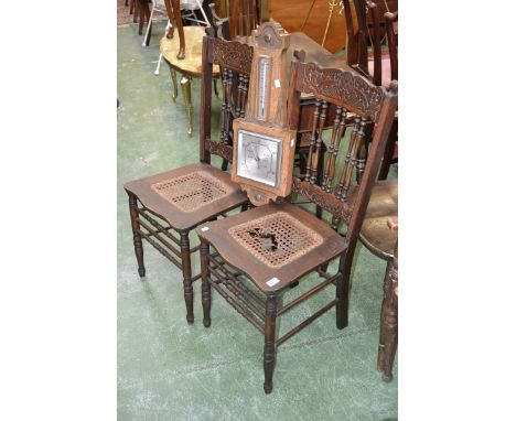 A mid 20th century oak barometer, silvered square dial, moulded detail, presentation plaque, c.1950 a pair of chairs, rattan 