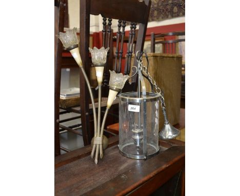 A 1950's brass wall light; a glass and metalwork lantern (2)