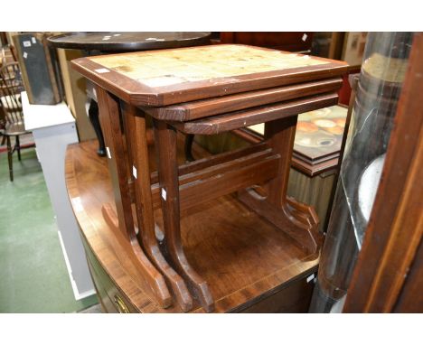 A G-Plan tile topped nest of three tables