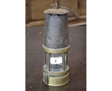A 19th century brass and metal miners lamp