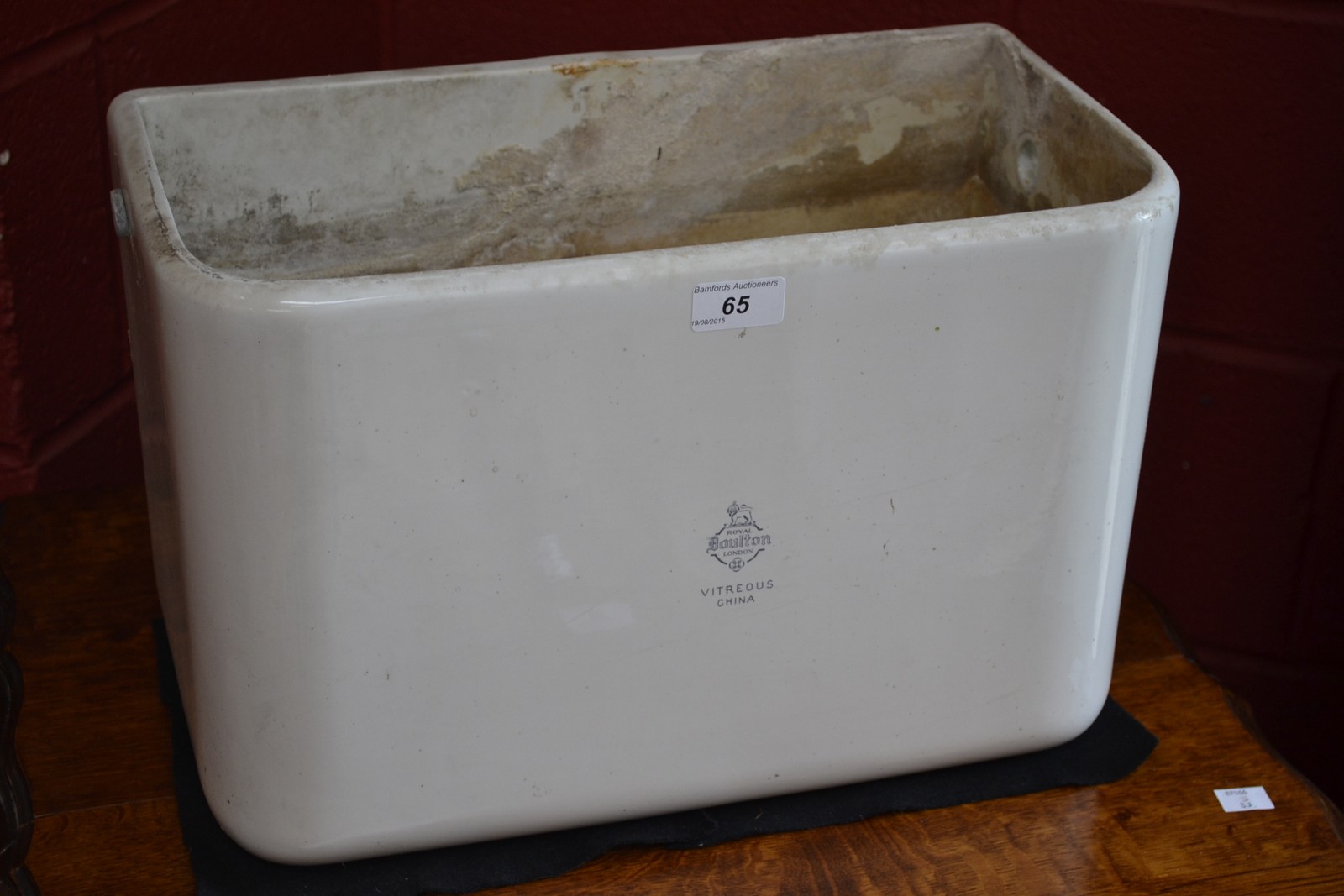 A Royal Doulton Vitreous China toilet cistern.