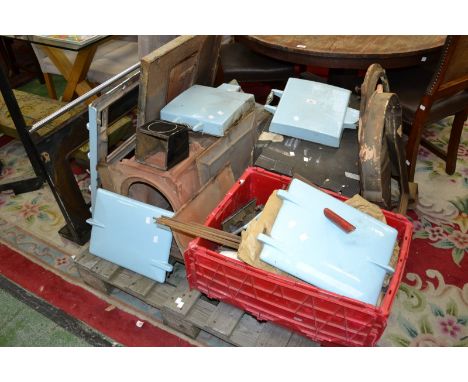 A light blue coloured Aga cooker, dismantled