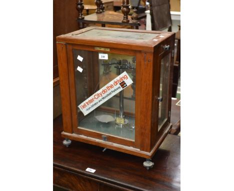 A set of W & J George and Becker scientific weighing scales.
