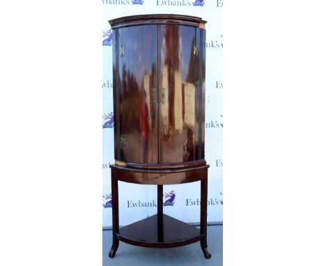 19th century mahogany bow fronted corner cabinet on stand.  