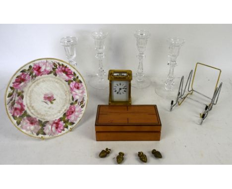 Brass and glass carriage clock, set of  four glass candle sticks, fruitwood box and a plate .  