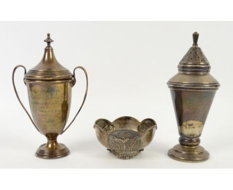 Silver miniature trophy cup and cover, an unusual silver caster and a small bowl marked 'silver' to the underside, (3) .  