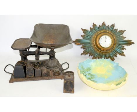 Victorian kitchen scales, a ceramic fruit dish from Rajastan and a sunburst clock.  