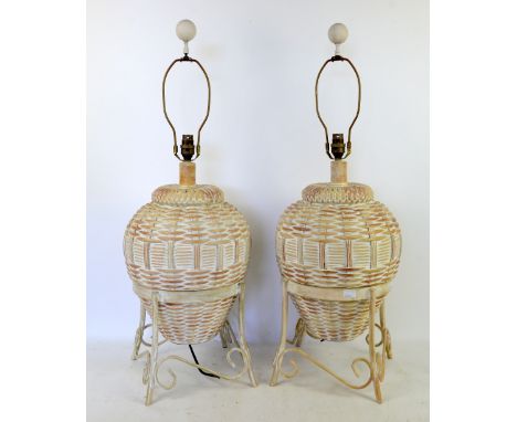 Collection of table lamps including turned oak bamboo effect lamps, two basket effect lamps, pink pottery lamp, blue and whit