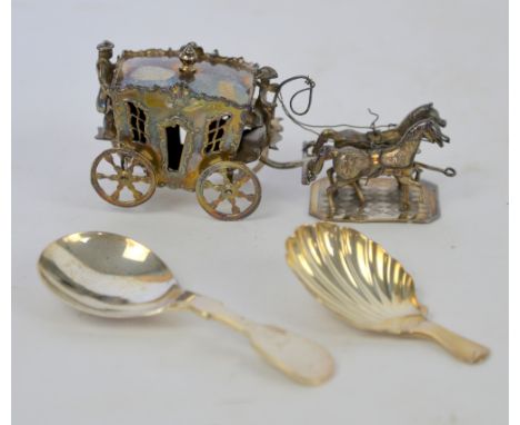 Dutch silver miniature horse and carriage and two silver caddy spoons, .  