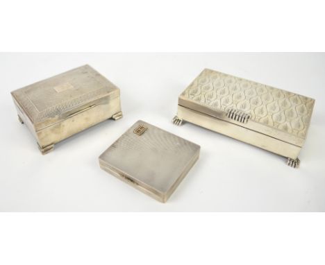 Two silver cigarette boxes and a cigarette case,.  General wear consistent with age and use. No personal inscriptions. Engine