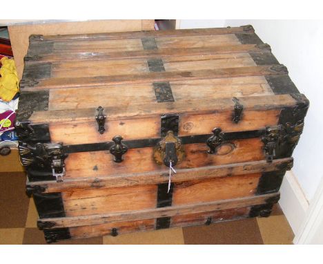 An antique metal bound trunk 