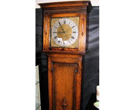 A chiming oak cased Grandmother clock 