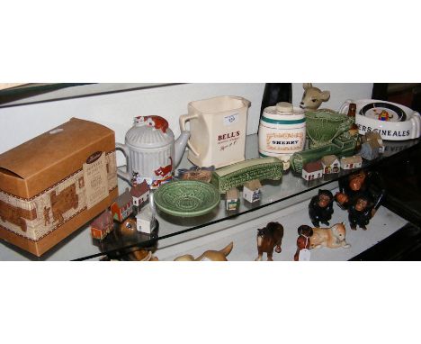 Selection of collectable Wade, including teapot, cottages, etc. 