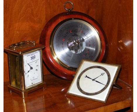 A carriage clock, mantle clock and wall barometer 