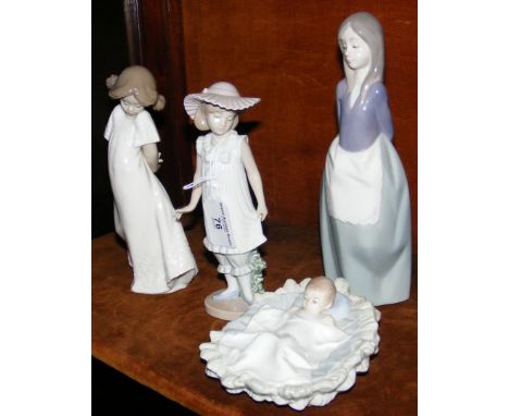A Nao figure of girl wearing hat, together with three others 