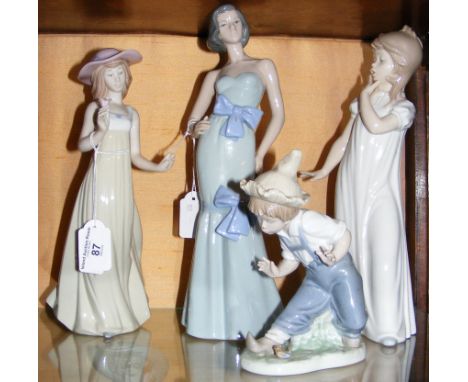 Four assorted Nao figurines 