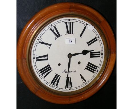 A circular antique style wall clock with painted dial 