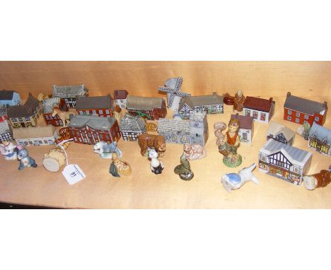 Extensive collection of Wade miniature buildings, Whimsies, yachts, etc. 