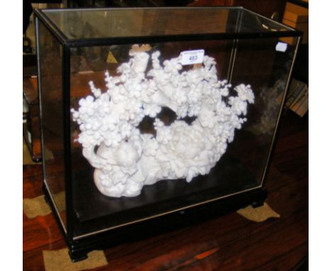 An intricate ceramic flower and bird display in glazed case - 40cm high 