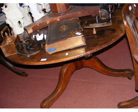 A large circular tripod table bearing Riddett & Son Furniture Makers stamp to the underneath - 120cm diameter 