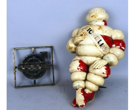 A Michelin Bibendum illuminated model with mounting bracket, height 47 cm together with a Volvo F89 bonnet badge (2).