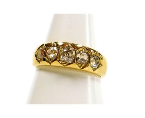 A diamond five stone dress ring, set with five rose cut diamonds, the largest approx 0.23cts, the smallest approx 0.15cts, on