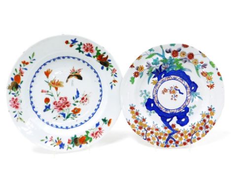 A Qing dynasty famille rose porcelain plate, decorated with fruit, flowers and a butterfly, 22.5cm diameter, and an early 19t