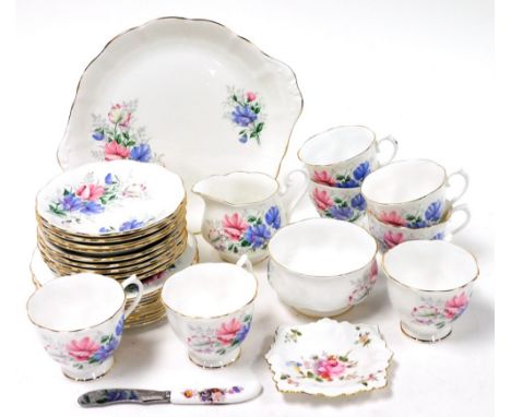 A Royal Albert porcelain Friendship Sweet Pea part tea service, comprising seven teacups, nine saucers, seven cake plates, mi