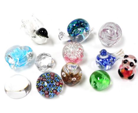 A group of glass paperweights, to include a Caithness Golden Jubilee commemorative paperweight, 7cm high, model of a snail, 9