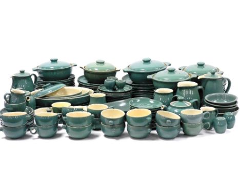 An extensive Denby Manor Green pottery tea and dinner service, to include tureens, dinner plates, teapots, two handled soup b