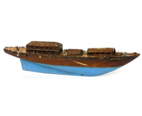A teak mid 20thC wooden model of a Chinese junk, with realistic decking, partially painted blue, 77cm wide. 