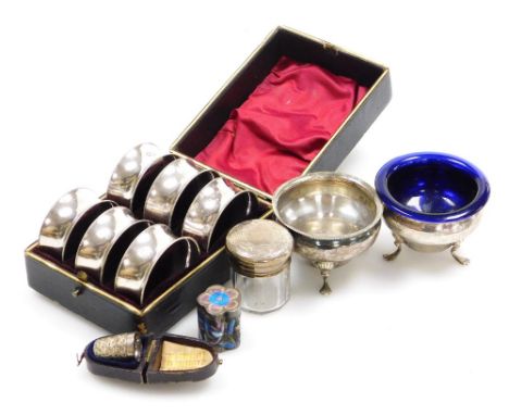 A group of silver and silver plated items, to include a set of six silver plated napkin rings, each engraved with a number 1-