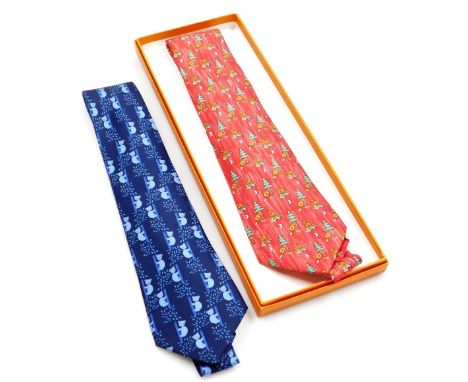 Two Hermes silk ties, comprising a red tie with all over beaver design, and a blue tie decorated with koalas, one boxed.