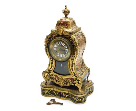 A late 19thC French boulle work mantel clock on stand, the clock with brass dial bearing Arabic and Roman numerals, eight day