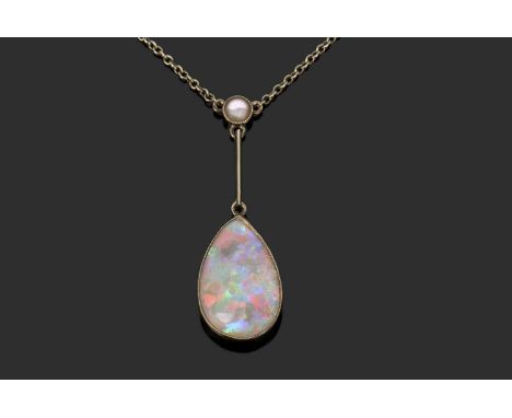 Vintage pear shaped opal pendant necklace, suspended from a knife edge bar and highlighted with a small seed pearl, having tr