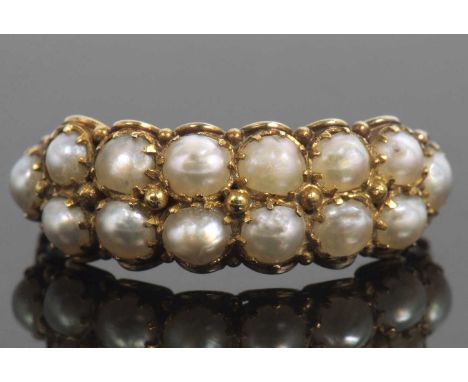 Victorian seed pearl ring, a double row design featuring fourteen small pearls in an ornate decorated beaded enclosed gallery