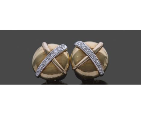 Pair of Werner Zappe diamond set earrings, a stylised button design, each applied with a graduated diamond set band over a pl