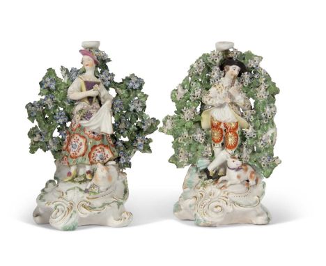 Two Chelsea Derby bocage candlestick figures c1770 of a male musician and female flower seller (2)23cm highSconces missing ty