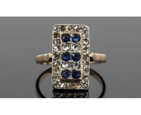 Sapphire and diamond tablet ring, 16x9mm, with six small round cut sapphires and 28 small single cut diamonds, stamped 18k, s