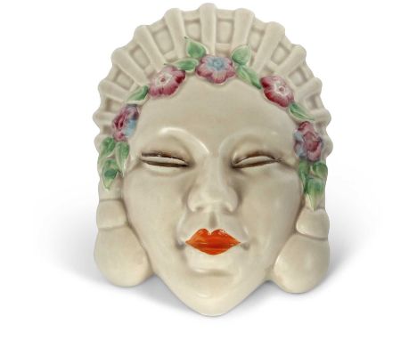 Clarice Cliff wall pocket designed as a young lady with headress, possibly Marlene Dietrich