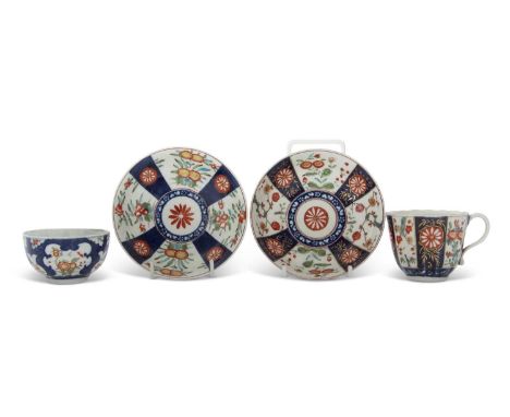 Two 18th Century English porcelain tea bowl and saucer and cup and saucer both Worcester decorated with Kakiemon designs in b