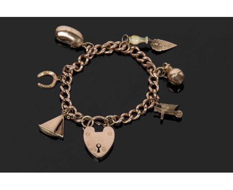 Antique 9ct gold curb link bracelet suspending five various 9ct charms and an unmarked trowel charm, g/w 27.2gms