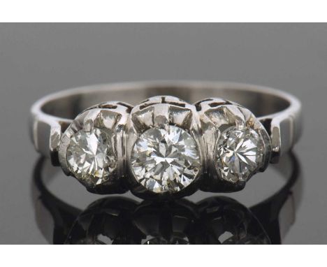 Diamond three stone ring featuring three graduated round brilliant cut diamonds, bezel and claw set, 0.50ct approx, size M/N