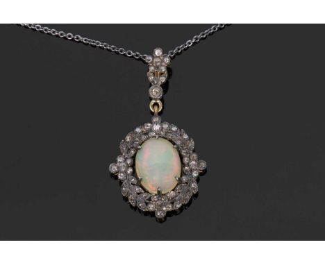 Opal and diamond pendant, the oval cabochon opal within a small old cut diamond surround all in an enclosed setting, suspende