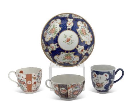 Worcester cup and saucer Kakiemon designs within blue ground panels together with a rich queen pattern cup and a further scar
