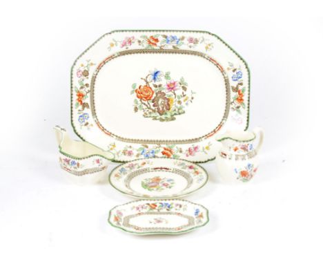 A Copeland Spode 'Chinese Rose' pattern part dinner service, including plates, bowls, sauce boats and stands, meat platters a