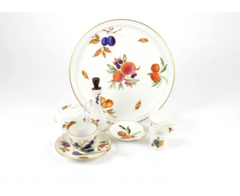 A collection of Royal Worcester 'Evesham' pattern porcelain tableware, including plates of various sizes, bowls, soup bowls, 