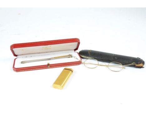 A Cartier gilt lighter, together with a cased Cartier silver pen (af), and a cased pair of Edwardian yellow metal framed spec