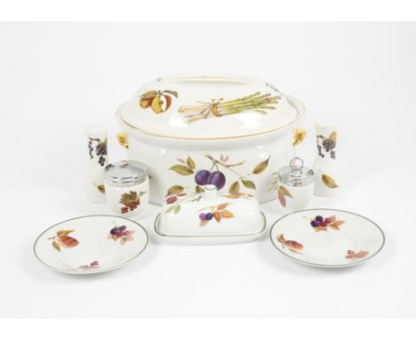 A collection of Royal Worcester 'Evesham' pattern tableware, including salt and pepper shakers, butter dish, casserole dish, 